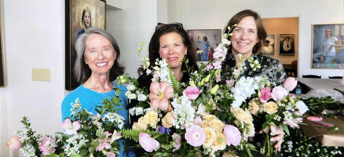 Members enjoy flower arrangements